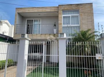 Casa · 240m² · 4 Quartos · 2 Vagas · Sobrado com 4 dormitórios , 1 suíte com sacada, no bairro Harmonia em Canoas/RS