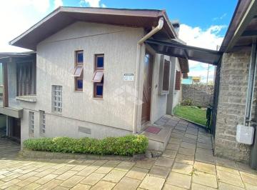 Casa · 158m² · 3 Quartos · 2 Vagas · Casa de dois pisos, de esquina e boa localização a venda em Carlos Barbosa.