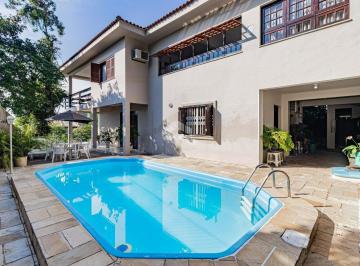 Casa · 267m² · 3 Quartos · 1 Vaga · Excelente casa com 03 dormitórios, piscina, salão de festas, bairro Sétimo Céu em Porto Alegre.