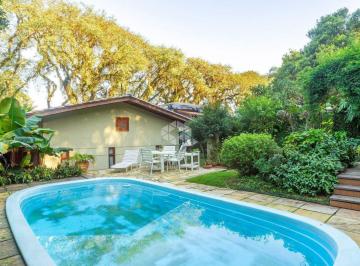 Casa · 213m² · 3 Quartos · 4 Vagas · Casa com 213m² de área privativa, 3 dormitórios, 1 suíte, pátio amplo com piscina no jardim Isabel
