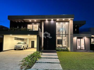 Casa · 380m² · 4 Quartos · 2 Vagas · Sobrado com 4 Suítes, garagem coberta para 02 carros, no condomínio fechado Lago do Passo em em Atlâ