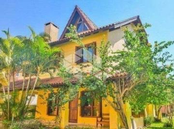 Casa · 174m² · 3 Quartos · 2 Vagas · Casa em condomínio com 03 dormitórios no bairro Guarujá