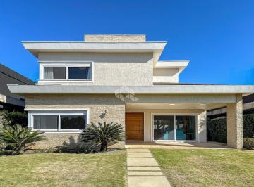 Casa · 310m² · 4 Quartos · 2 Vagas · Sobrado 4 suítes, mobiliado e decorado, piscina de concreto em um condomínio fechado a beira mar na 