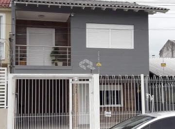 Casa · 187m² · 4 Quartos · 2 Vagas · Crédito Real vende linda casa no Bairro Harmonia em Canoas.