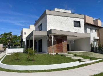 Casa · 162m² · 3 Quartos · 2 Vagas · CASA COM 3 SUÍTES EM CONDOMÍNIO FECHADO NA CACHOEIRA DO BOM JESUS COM INFRAESTRUTURA COMPLETA E LOCA
