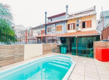 Casa · 156m² · 3 Quartos · 2 Vagas · Ótimo sobrado com piscina no Portal do Guarujá.
