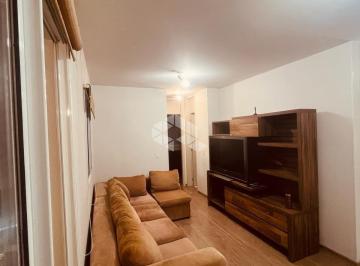 Photo 1 · Apartamento de 2 dormitórios e 1 vaga de garagem, no bairro Humaitá, em Porto Alegre.