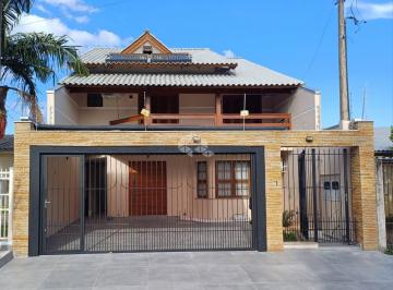Casa · 197m² · 4 Quartos · 2 Vagas · Oportunidade Imperdível! Casa de Alto Padrão com 3 Suítes e Área de Lazer Completa!