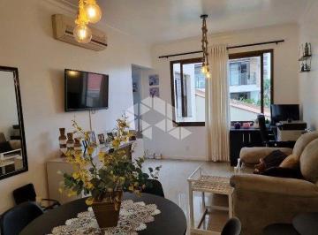 Apartamento · 75m² · 2 Quartos · 1 Vaga · Apartamento de 2 dormitórios com suíte , elevador e garagem coberta no bairro Menino Deus.