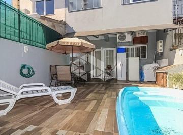 Casa · 124m² · 3 Quartos · 2 Vagas · BELO SOBRADO COM PISCINA NO PÁTIO, SUÍTE COM SACADA E GARAGEM COBERTA