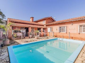 Casa · 156m² · 3 Quartos · 2 Vagas · Casa 3 dormitórios com piscina no Bairro Guarujá na Zona Sul de Porto alegre