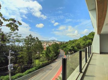 Casa · 260m² · 4 Quartos · 2 Vagas · Casa em condomínio alto padrão com 4 suítes e vista panorâmica para o mar em Garopaba SC