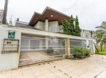 Casa · 260m² · 3 Quartos · 2 Vagas · Casa de 3 dormitórios sendo uma suíte,com churrasqueira, lareira, piscina, à venda no bairro Moinhos