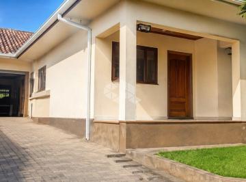 Photo 1 · CASA COM TRÊS DORMÍTÓRIOS