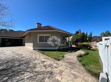 Casa · 238m² · 4 Quartos · 2 Vagas · Viva o Luxo em uma Casa Térrea Exclusiva em Gramado