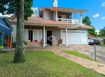 Photo 1 · Casa sobrado a venda, 3 dormitórios (01 suíte), com hidromassagem em Campo Bom.