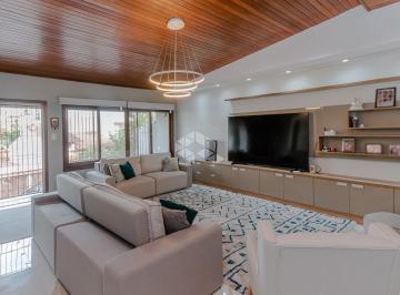 Casa com 4 dormitórios no Chácara das Pedras (15) · Casa 300m², 6 dormitórios no Três Figueiras, Porto Alegre.