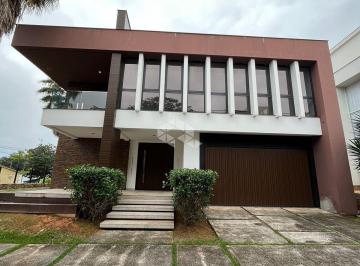 Casa · 436m² · 3 Quartos · 2 Vagas · Casa com vista para o mar em condomínio fechado em Cacupé.