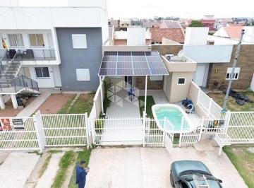 Casa · 70m² · 2 Quartos · 1 Vaga · Casa com suíte, piscina e placas solares no Centro Novo