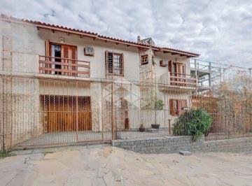 Casa · 189m² · 3 Quartos · 2 Vagas · Casa estilo Sobrado 4 dormitórios suíte closet sacada no bairro Cavalhada Zona Sul de POA/RS.