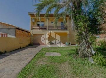 Casa · 216m² · 3 Quartos · 2 Vagas · Casa com 3 quartos sendo uma suite na Harmonia em Canoas