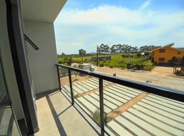 Casa · 76m² · 2 Quartos · 2 Vagas · Sobrado com 2 suítes, churrasqueira e quintal à venda em Imbituba