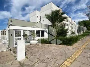 Apartamento · 53m² · 2 Quartos · 1 Vaga · Apartamento térreo com 53m², 2 dormitórios, churrasqueira e 1 vaga na Cavalhada