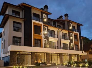 Apartamento · 68m² · 2 Quartos · 1 Vaga · Apartamento 2 dormitórios (1 suíte) + lavabo, com 68,08m² privativos no Centro de Gramado