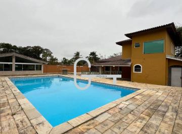 5790ef41f8cebf139c6616a09bc15970bb7c5463 · Casa com 5 dormitórios à venda, 400 m² por R$ 1.650.000,00 - Bougainvillee V - Peruíbe/SP