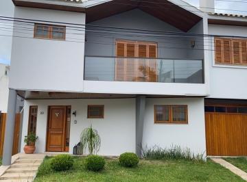4cb11a8362ef394c9f81a1ea456560616ab38395 · Casa com 3 dormitórios à venda, 270 m² por R$ 1.500.000,00 - Junção  - Rio Grande/RS
