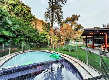 Casa · 343m² · 4 Quartos · 3 Vagas · Elegante residência térrea, com 4 suites no Real Parque