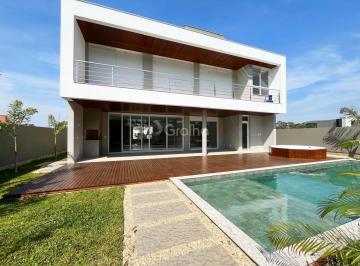 01 · Casa de 460m² com 5 suítes nos Ingleses do Rio Vermelho