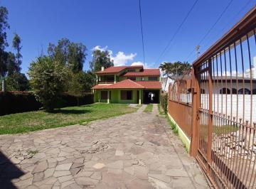 Casa · 350m² · 4 Quartos · 3 Vagas · Casa com 4 dormitorios com 2 suites