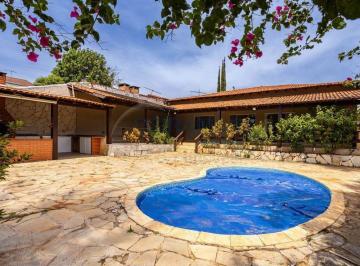 Casa · 329m² · 4 Quartos · 3 Vagas · Casa térrea de luxo: 4 quartos, 3 suítes com closet, piscina aquecida e lazer em condomínio fechado