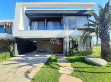 Casa · 328m² · 6 Quartos · 2 Vagas · Casa contemporânea com 6 suítes a beira lago
