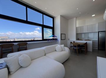 Sala de estar · Apartamento de alto padrão com 2 dormitórios e vista mar a venda em Torres