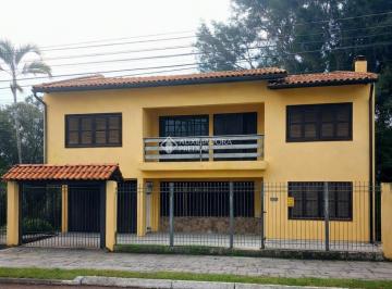 Copilot_20260311_145940 · "Casa Ampla e Bem Localizada à Venda em Canoas"