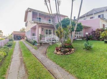 Casa · 284m² · 4 Quartos · 3 Vagas · Sobrado em bairro alto, com vista na Zona Sul de Porto Alegre