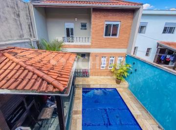 Casa · 350m² · 5 Quartos · 6 Vagas · Imóvel com duas casas, área gourmet e piscina aquecida