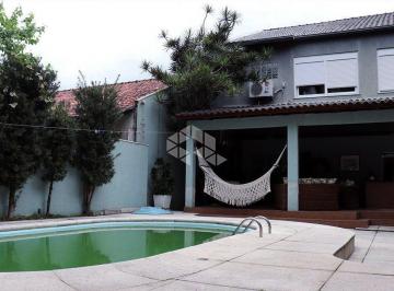 710885_i67854u_71088568c4279559bc2.jpg · Casa com 3 pavimentos, 330m², piscina e 3 vagas de carros, com churrasqueira.