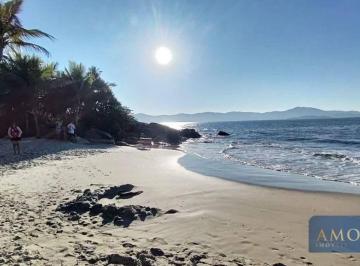 e0a77e8944168c74238714d4e9ff5cd44a4e2646 · Apartamento com acesso direto para praia, com 3 dormitórios à venda, 135 m² - Florianópolis/SC