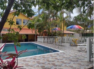 Casa · 503m² · 8 Quartos · 5 Vagas · Excelente Oportunidade em Massaguaçu, Caraguatatuba - A Apenas 600m da Praia da Cocanha!