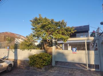 703975_iTIKw6gpxR8hV65lQ1ZYq_703975687eb7d5e61cc.jpg · Excelente Casa ampla com piscina, pátio, 5 vagas, lareira, churrasqueira e apto independente próxima