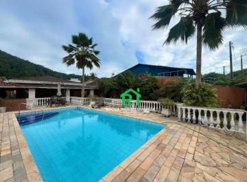 Piscina · Casa com 4 quartos (3 suítes), 4 vagas e lazer à venda em Jardim Guaiuba, Guarujá