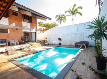 94f58f52bcc2789f56556ca771e7e02bda40df10 · Casa com 3 dormitórios à venda, 317 m² por R$ 1.100.000,00 - Praia de Pernambuco - Guarujá/SP