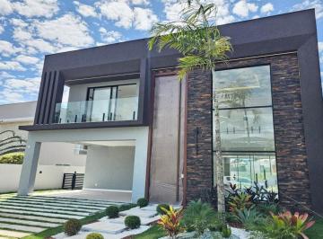 Casa · 275m² · 4 Quartos · 4 Vagas · Casa luxo no Alphaville Litoral Norte I: 4 suítes, 3 salas, 4 vagas, 275 m². Lindíssima!