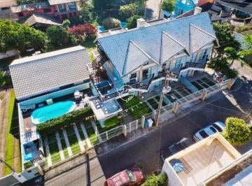 Comercial · 593m² · 16 Quartos · 8 Vagas · Pousada à venda na Praia do Santinho – 16 dormitórios e excelente localização