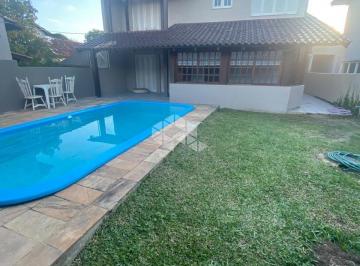 Casa · 257m² · 4 Quartos · 3 Vagas · Casa Completa com Piscina, Salão de Festas e Vista para o Guaíba