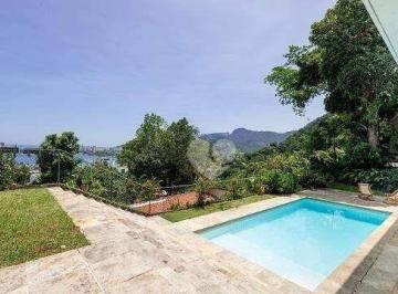 ab8c13ff75f04e1599f682015897b0a9776e6bb8 · Linda casa no Jardim Botânico na rua Caio de Melo Franco
