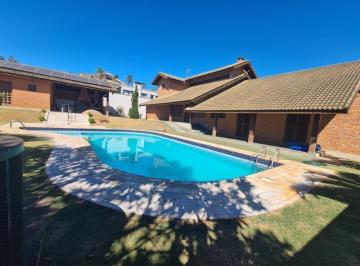 Foto 01 · Casa térrea estilo rústico no Condomínio Panorama em Atibaia SP. São 5 suítes, piscina, área gourmet